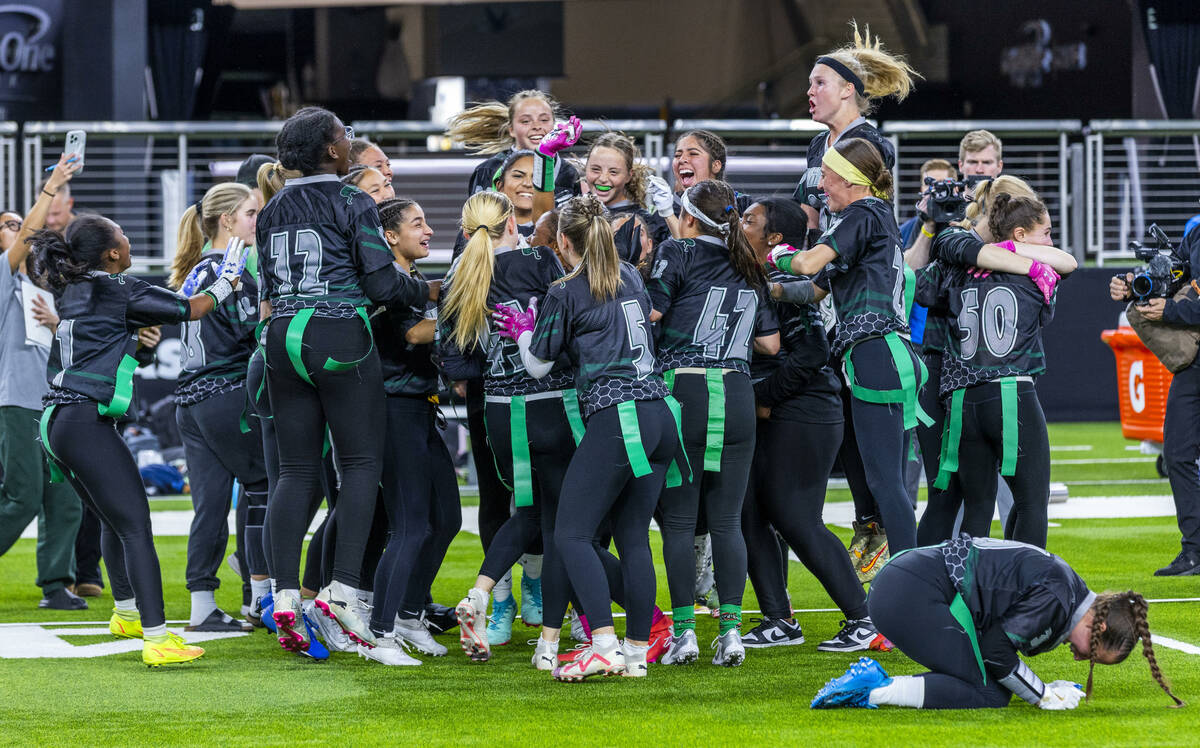 Palo Verde teammates celebrate after their 5A flag football championship game win against Deser ...
