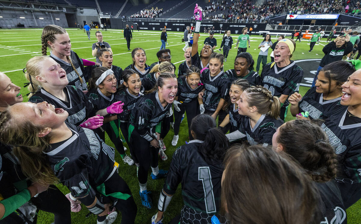 Palo Verde teammates celebrate after their 5A flag football championship game win against Deser ...