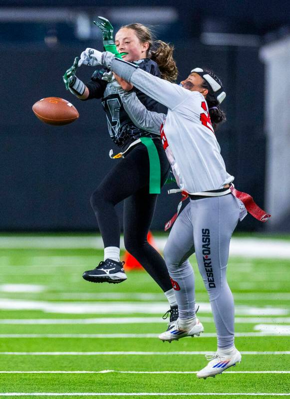 Palo Verde wide receiver Alexis Manzo (15) has the ball knocked away by Desert Oasis defensive ...