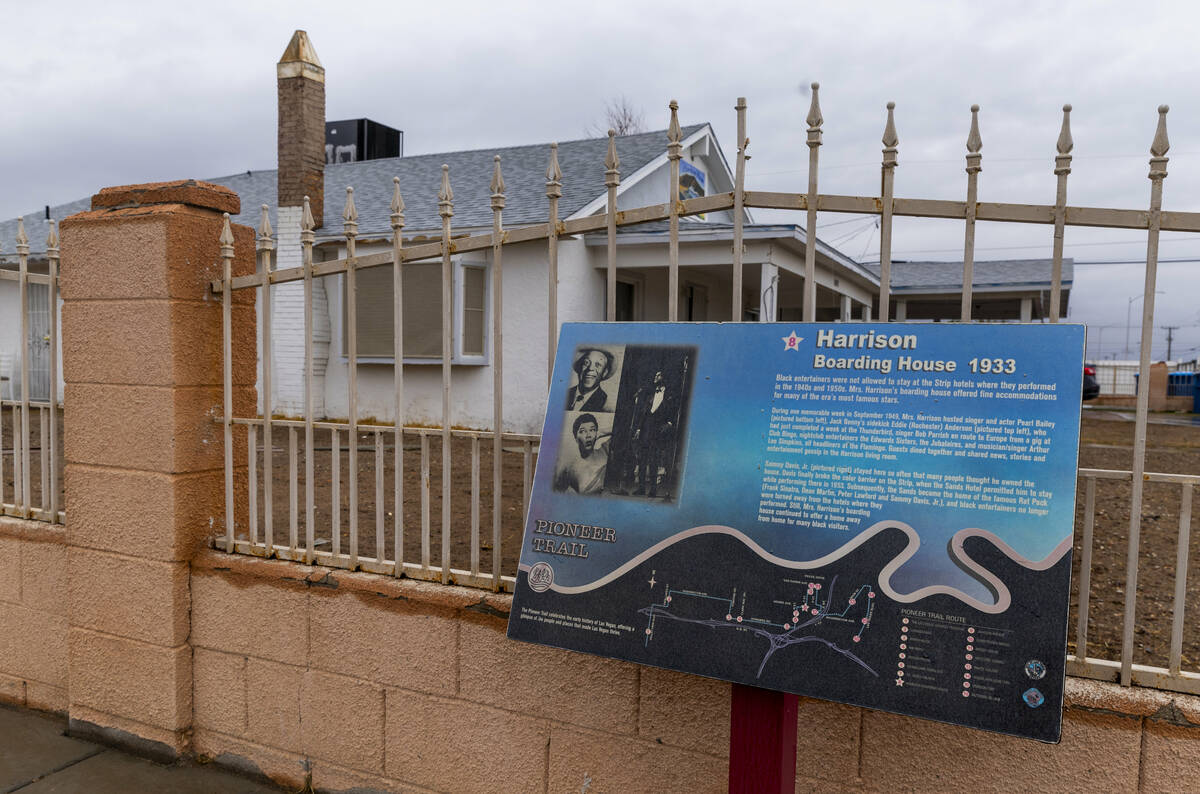 A Pioneer Trail information board outside the Harrison Guest House. A boarding house where, sta ...