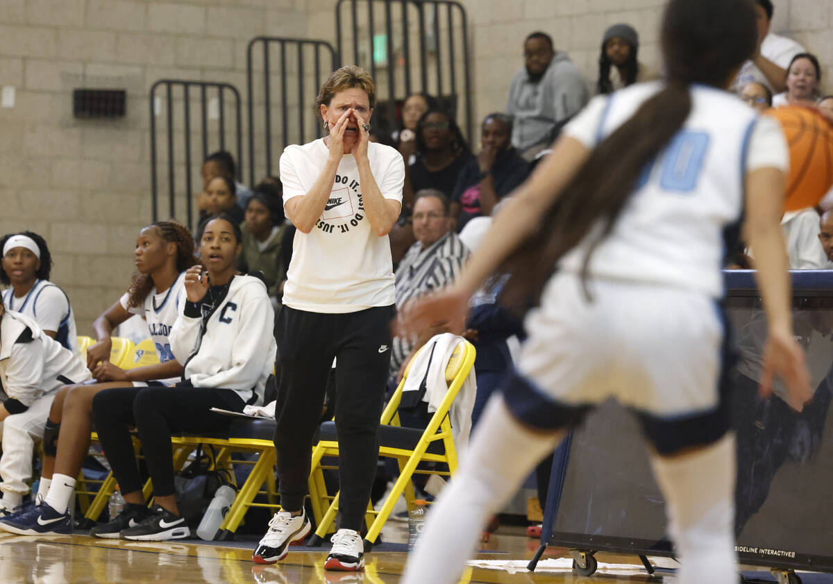 Centennial head coach Karen Weitz directs her players during their NIAA girls basketball game a ...