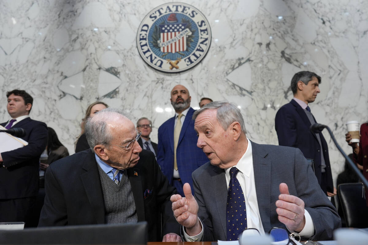 Senate Judiciary Committee Chairman Chuck Grassley, R- Iowa, left, confers with Sen. Dick Durbi ...