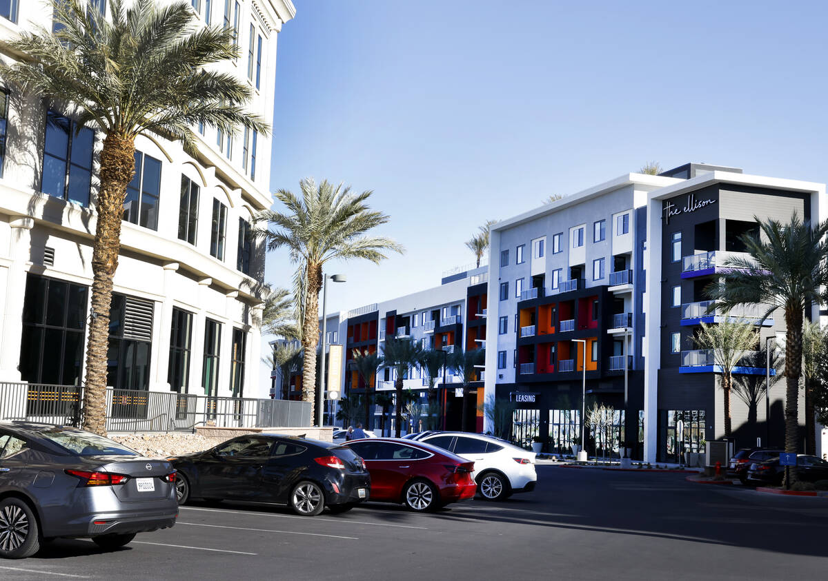 The Ellison, right, a new apartment complex at The Gramercy mixed-use center, is seen, on Frida ...