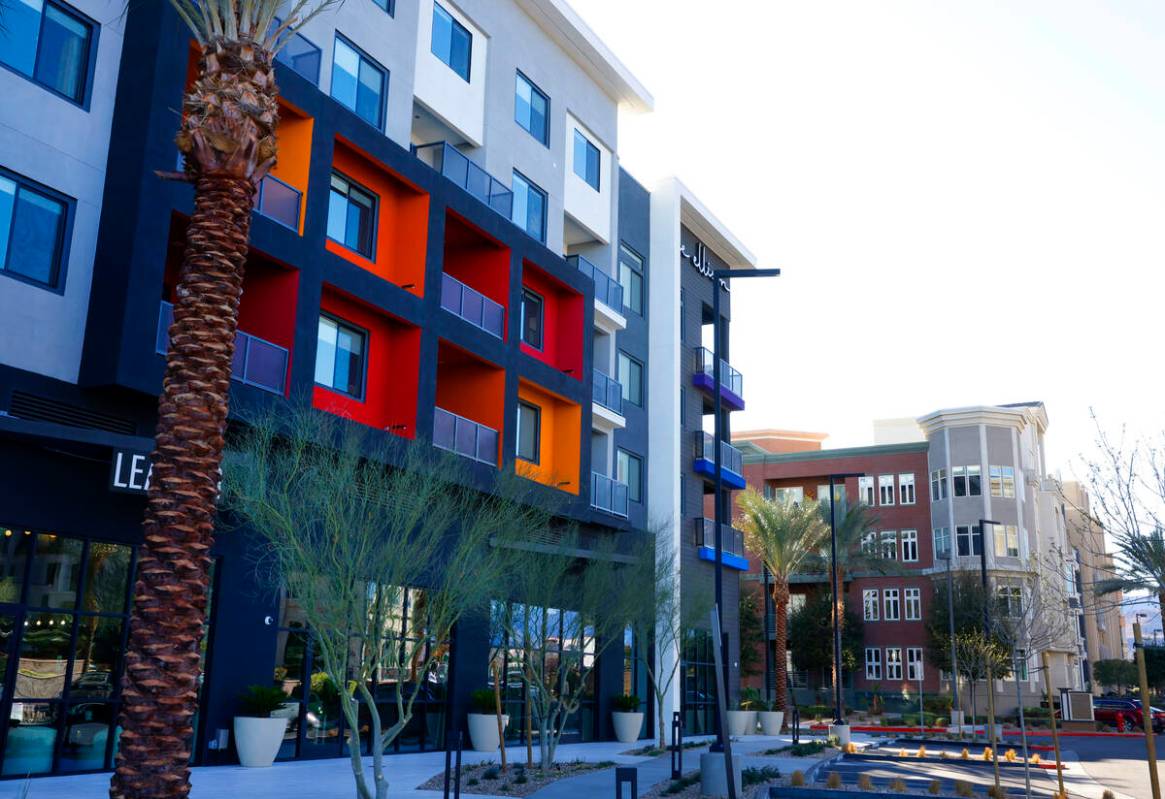 The Ellison, left, a new apartment complex at The Gramercy mixed-use center, is seen, on Friday ...