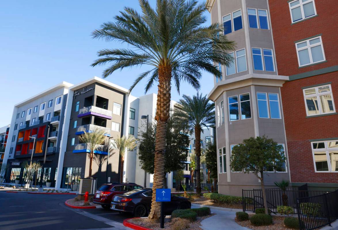 The Ellison, left, a new apartment complex at The Gramercy mixed-use center, is seen, on Friday ...