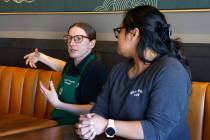 Sarah Friedman, left, a store manager at the Starbucks at North Aliante Parkway and the 215 Bel ...