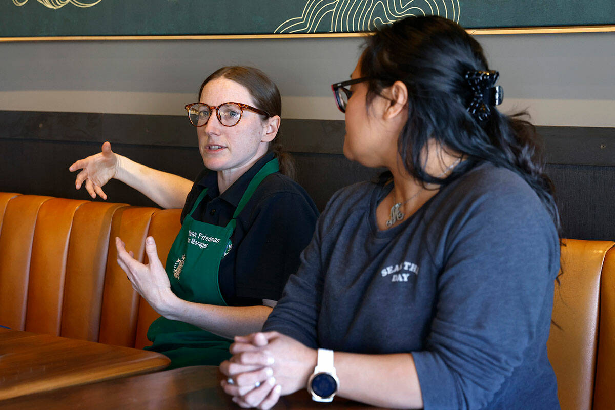 Sarah Friedman, left, a store manager at the Starbucks at North Aliante Parkway and the 215 Bel ...