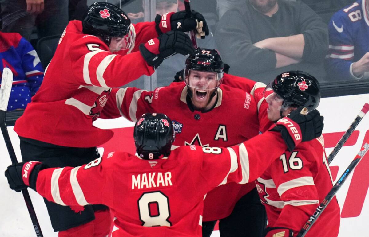 Canada's Connor McDavid (97) celebrates after his game-winning goal against the United States d ...