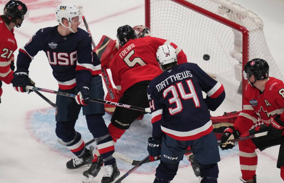United States' Brady Tkachuk, second from left, watches the puck enter the net on his goal agai ...