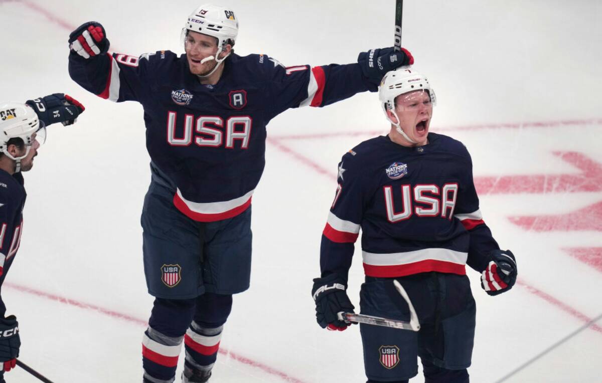 United States' Brady Tkachuk, right, celebrates after his goal against Canada during the first ...