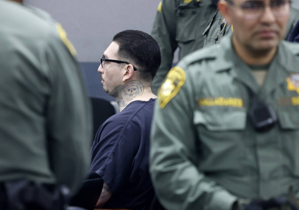 John Carrillo, who pleaded guilty in the killing of three people, appears in court during his s ...