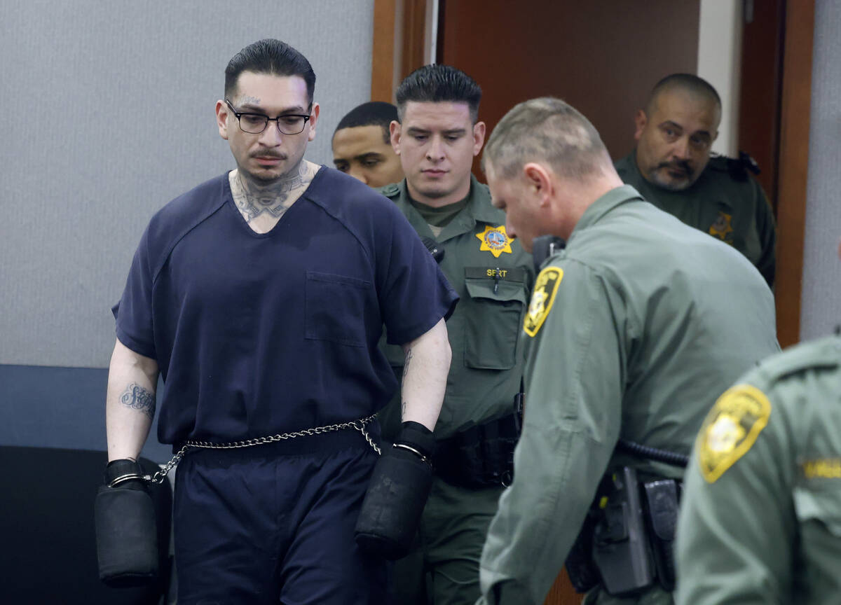John Carrillo, who pleaded guilty in the killing of three people, is led into a courtroom durin ...