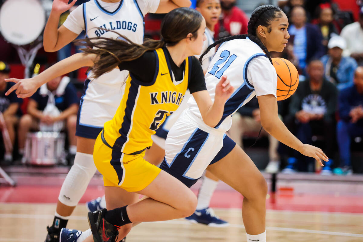 Centennial guard Aly Brown (21) rushes the ball down the court during a class 5A girls basketba ...
