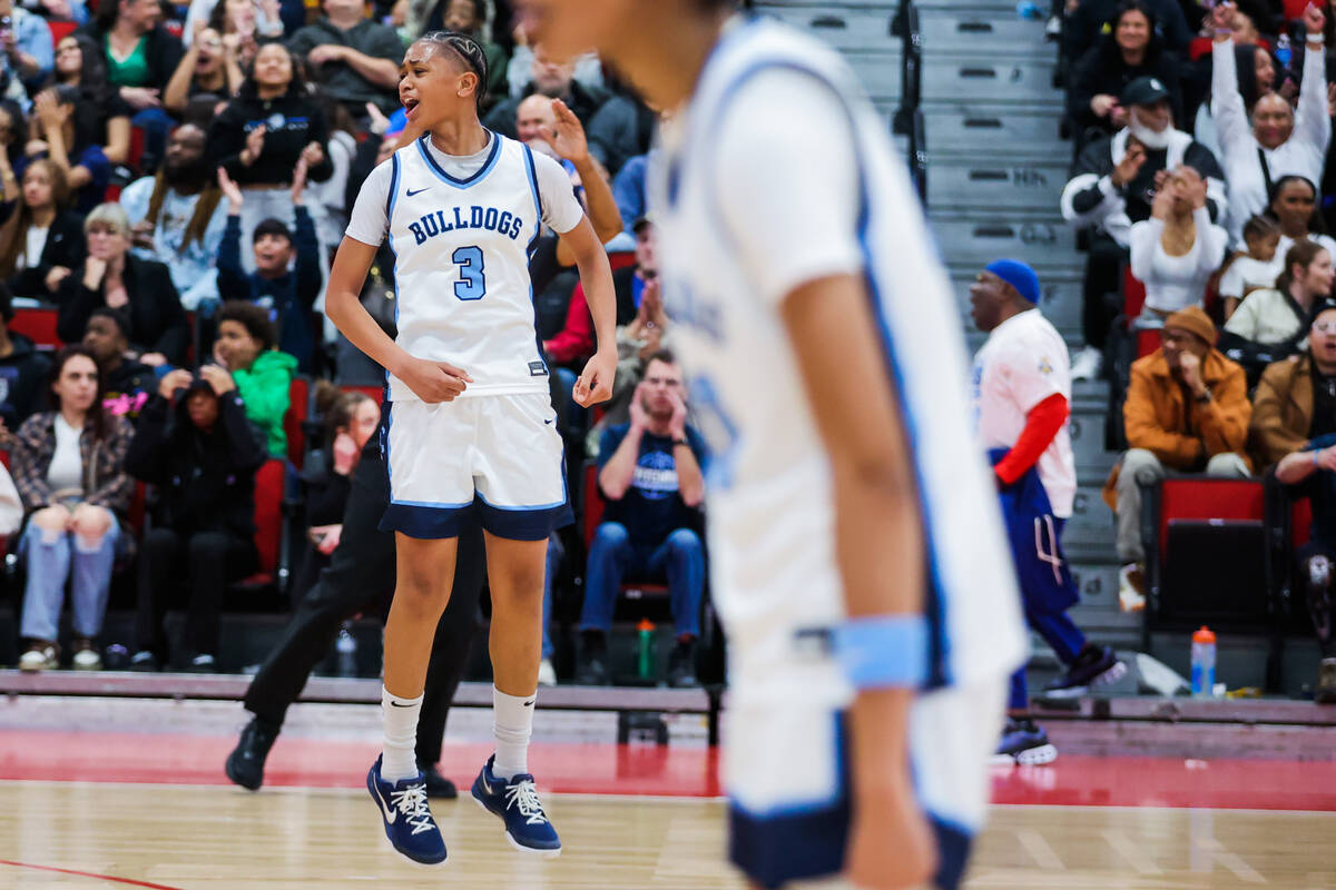 Centennial guard D'Arrah Mitchell (3) cheers after a teammate scored during a class 5A girls ba ...