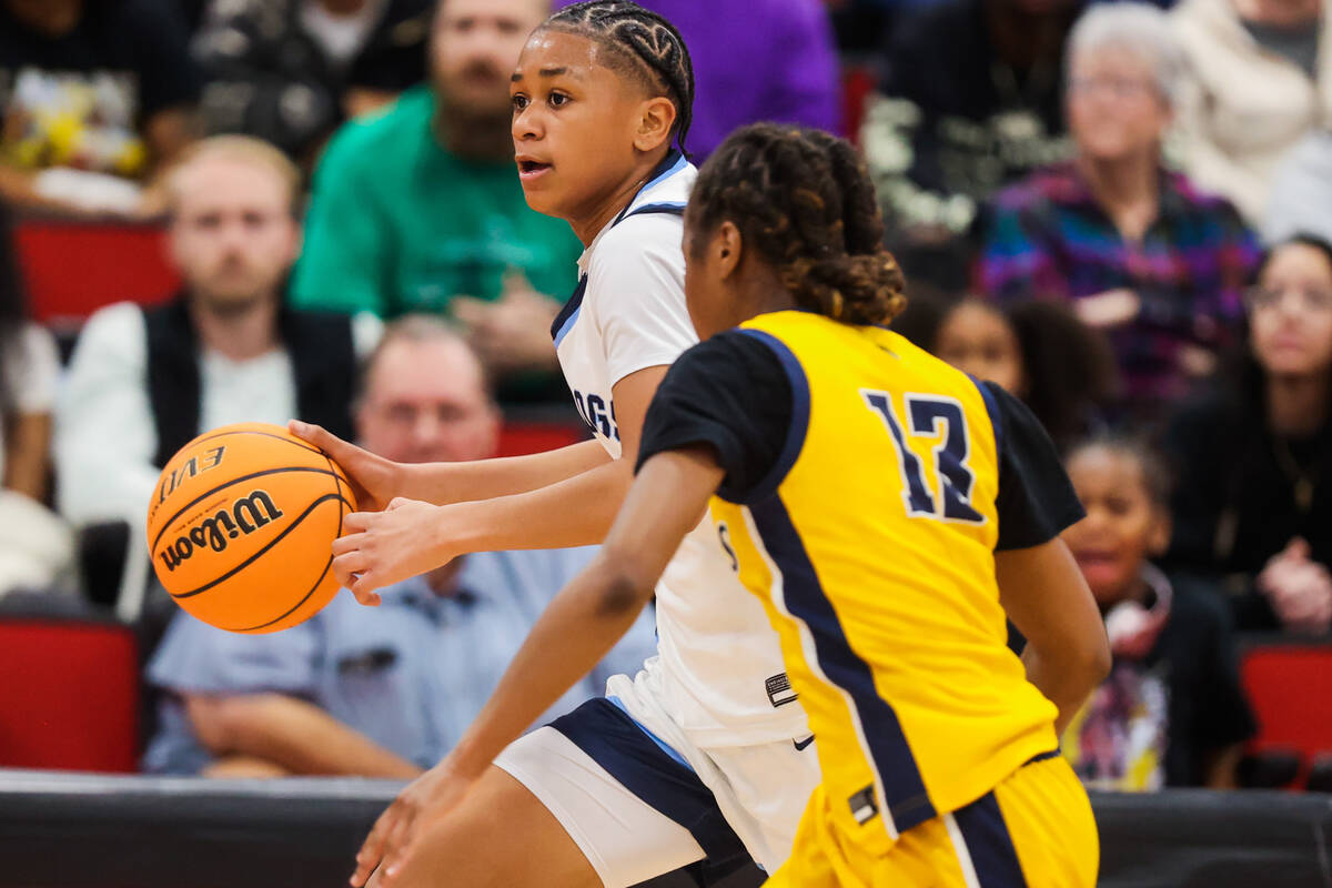 Centennial guard D'Arrah Mitchell (3) dribbles the ball during a class 5A girls basketball stat ...
