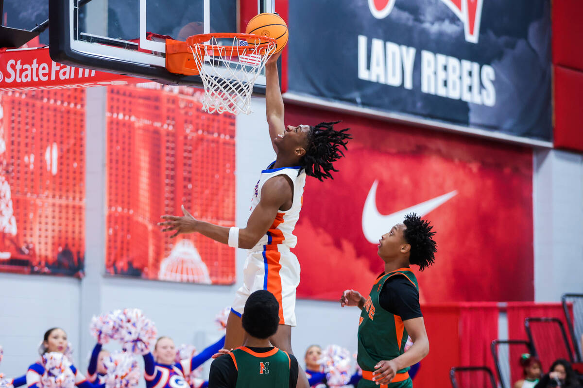 Bishop Gorman wing Jett Washington (2) goes for a layup during a class 5A boys basketball state ...