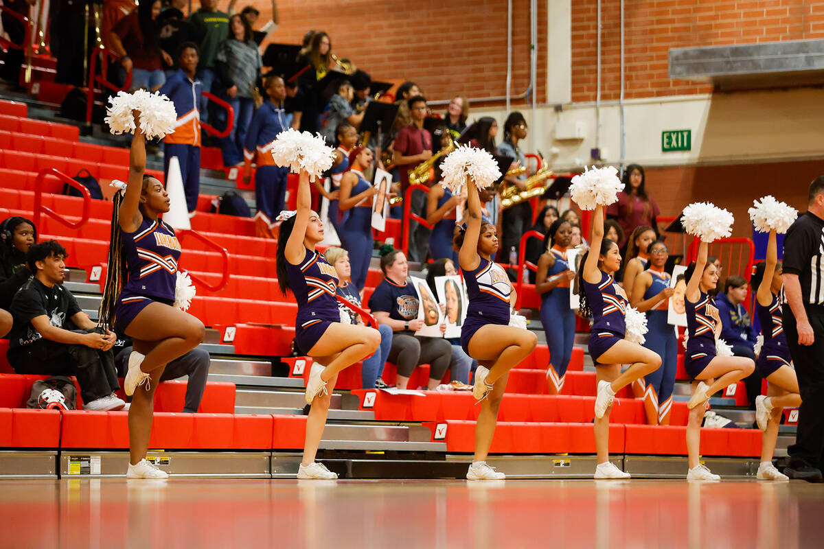 The Legacy High School cheer team poses during a Class 4A girls basketball state semifinal game ...