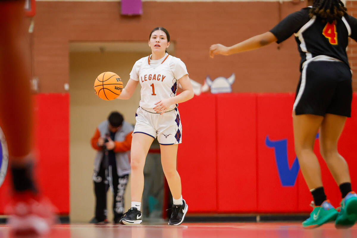 Legacy's Alabama Nieves (1) dribbles the ball up the court during a Class 4A girls basketball s ...