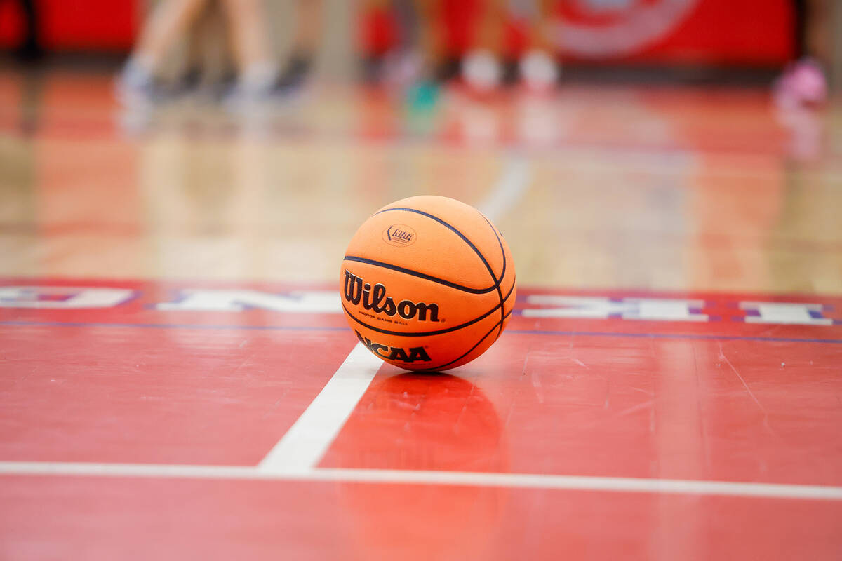 A ball sits on the court during a Class 4A girls basketball state semifinal game between Losee ...