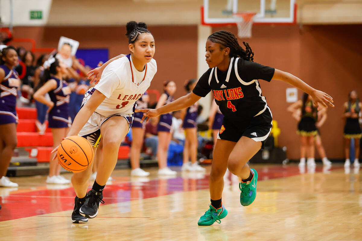 Legacy's Laila Gines (3) dribbles past Losee guard Kyleigha Butler (4) during a Class 4A girls ...