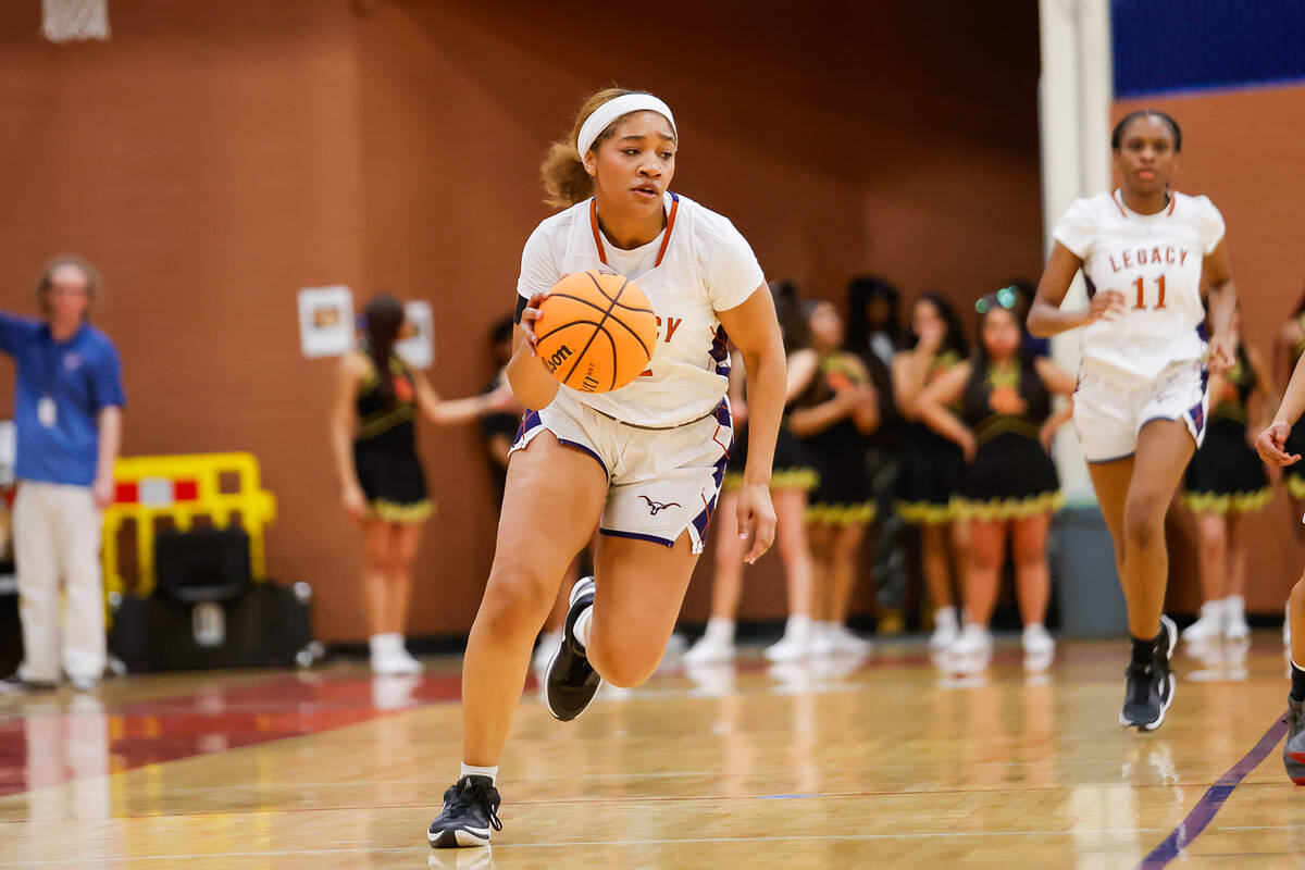 Legacy's Ajalee Williams (32) dribbles up the court during a Class 4A girls basketball state se ...