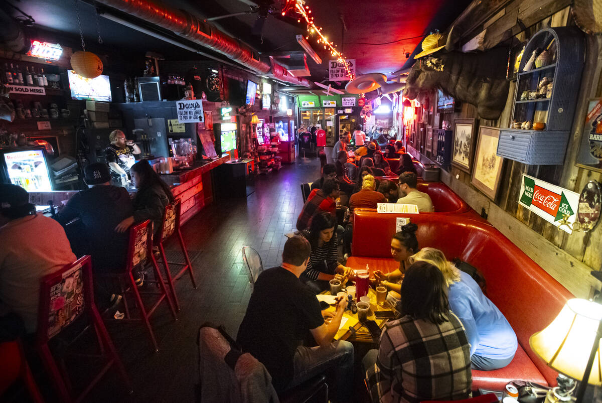 People participate in trivia night at ReBAR on Monday, Feb. 24, 2025, in Las Vegas. (Chase Stev ...