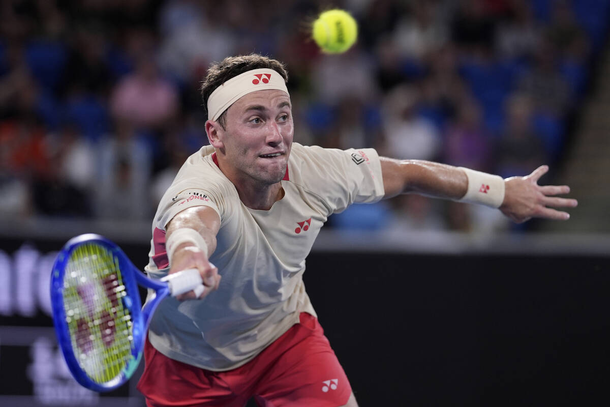 Casper Ruud of Norway plays a forehand return to Jakub Mensik of the Czech Republic during thei ...