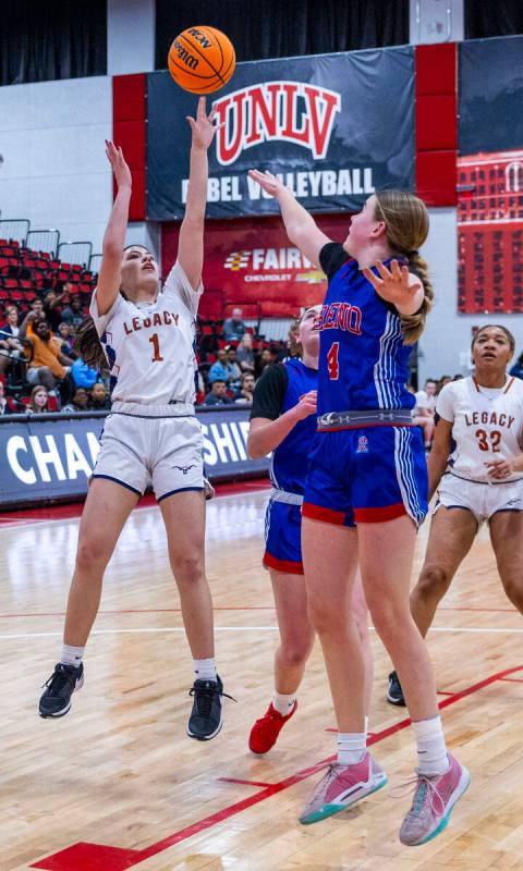 Legacy's Alabama Nieves (1) shoots over Reno guard Brookesly Wilson (4) during the first half o ...