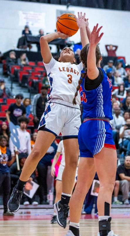 Legacy guard Laila Gines (3) shoots over Reno forward Natalia Schettler (23) during the second ...