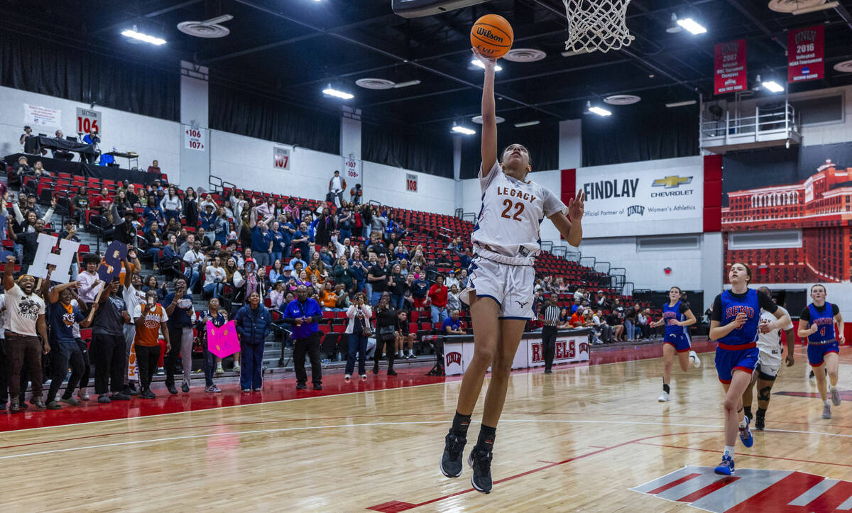 Legacy forward Trista Mabry (22) gets the last back in their win over Reno during their 4A girl ...