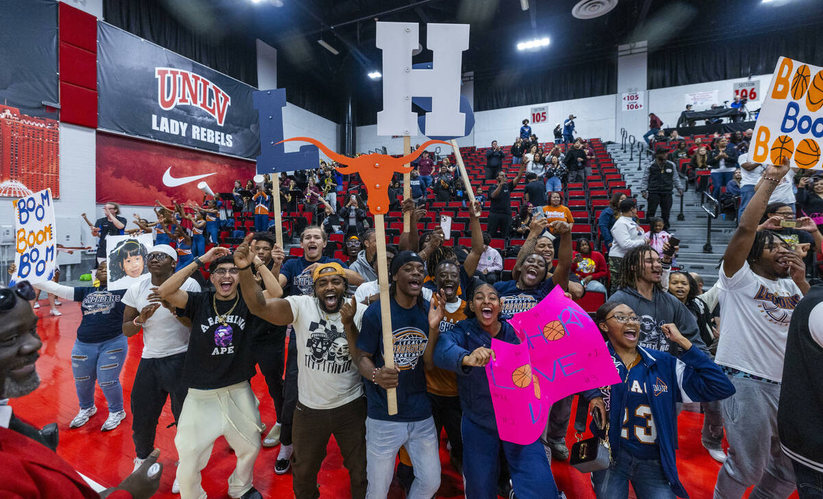 Legacy fans celebrate their win over Reno during their 4A girls basketball state championship g ...