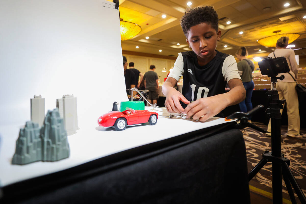 Ezra Ford, 8, works on a stop show movie during the fourth annual International Market of Minia ...