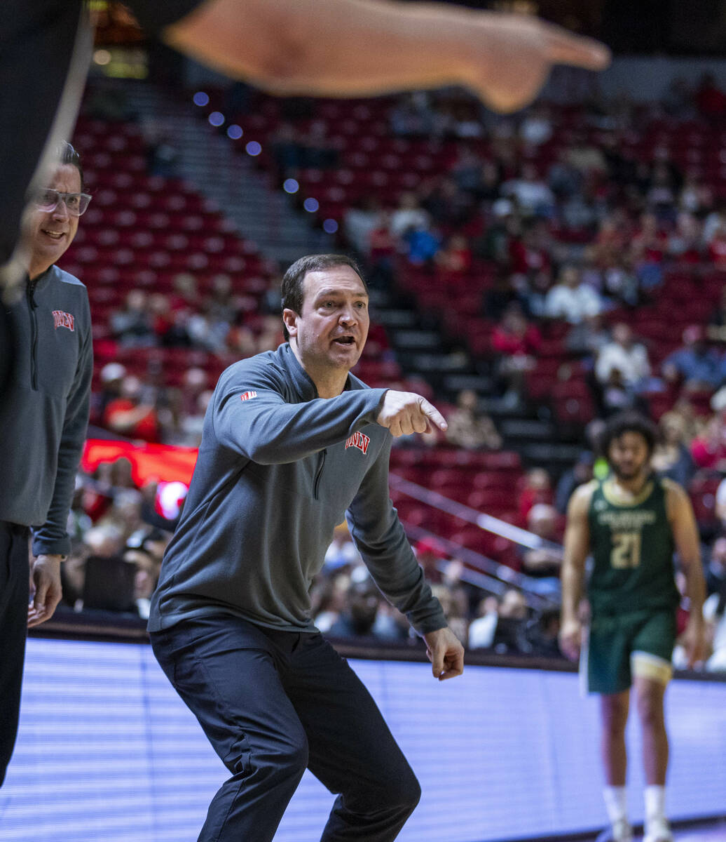 UNLV head coach Kevin Kruger is pleased with the team's play against Colorado State during the ...