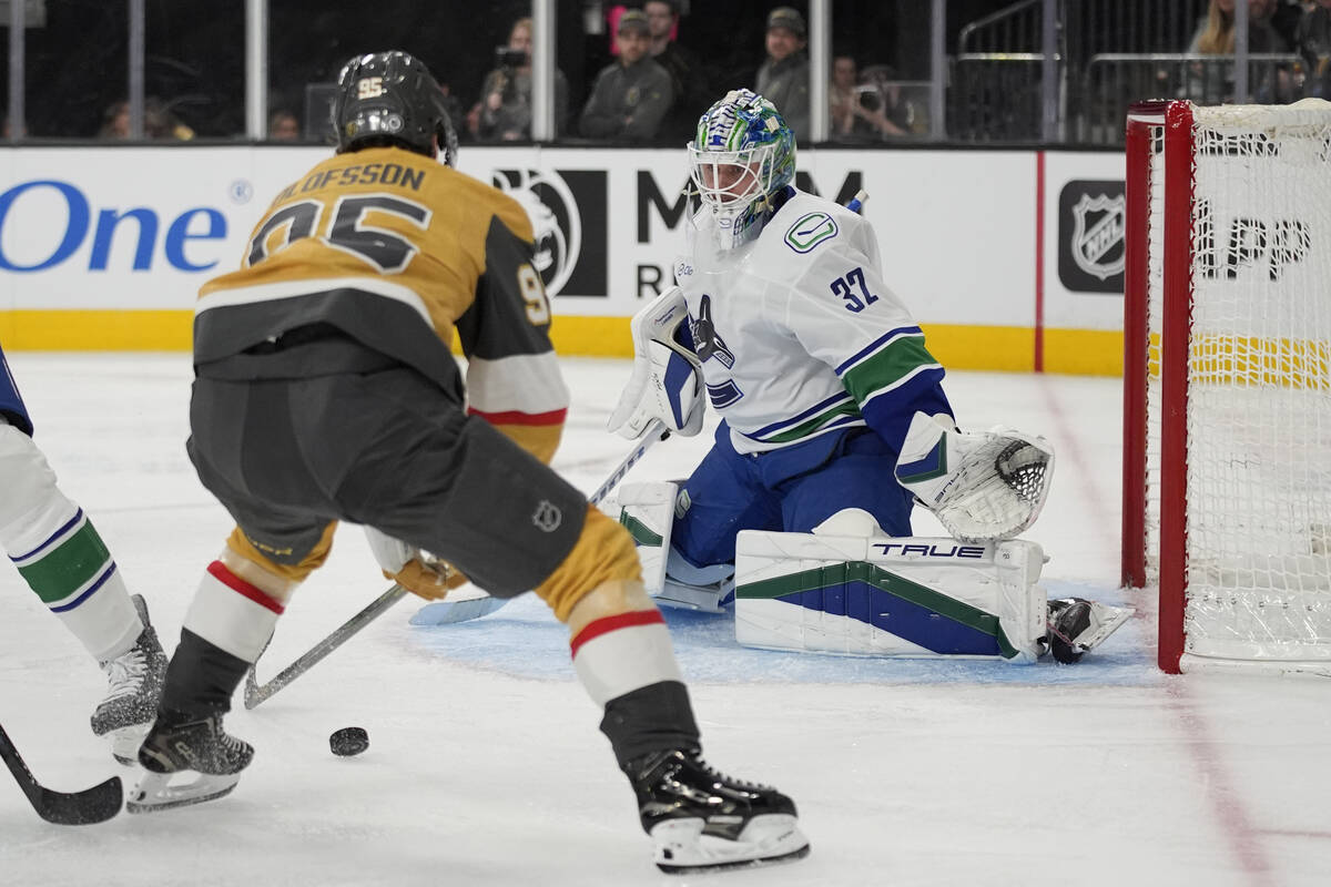 Vegas Golden Knights right wing Victor Olofsson (95) looks to shoot against Vancouver Canucks g ...