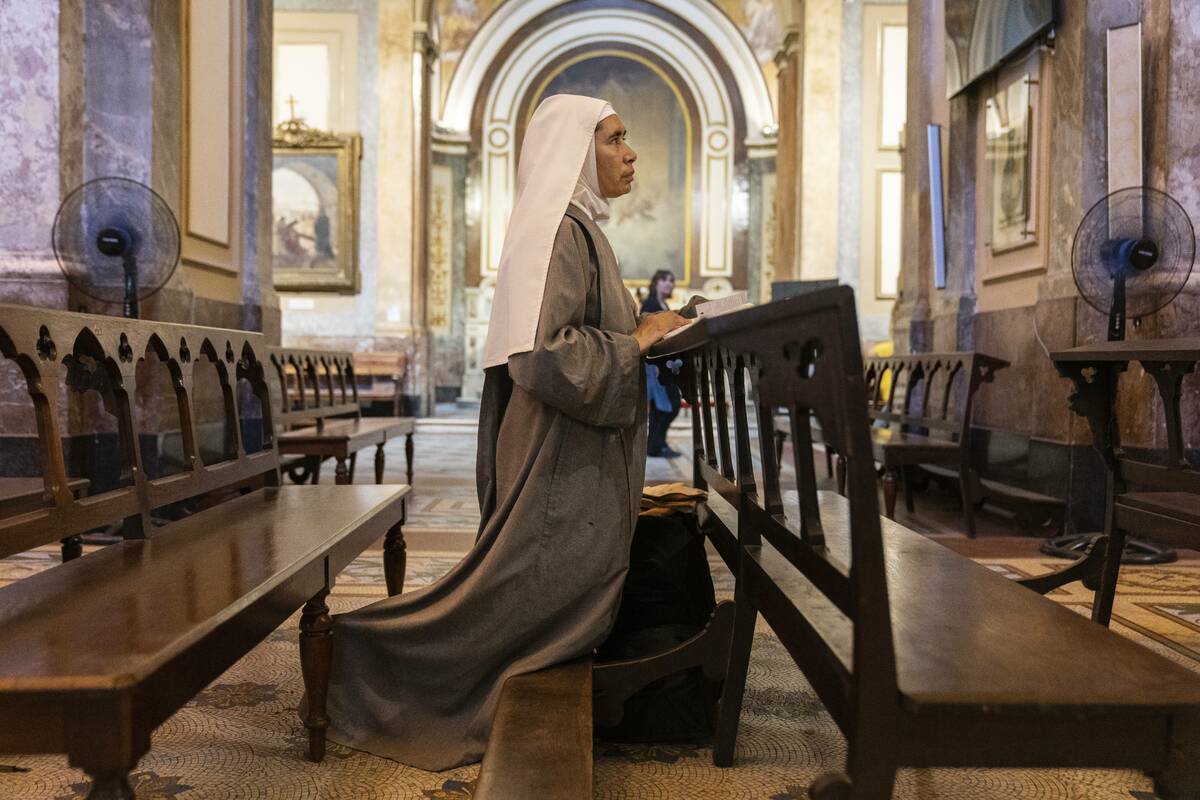 Missionary nun Maria Engracia, from Mexico, prays for the health of Pope Francis at the Metropo ...