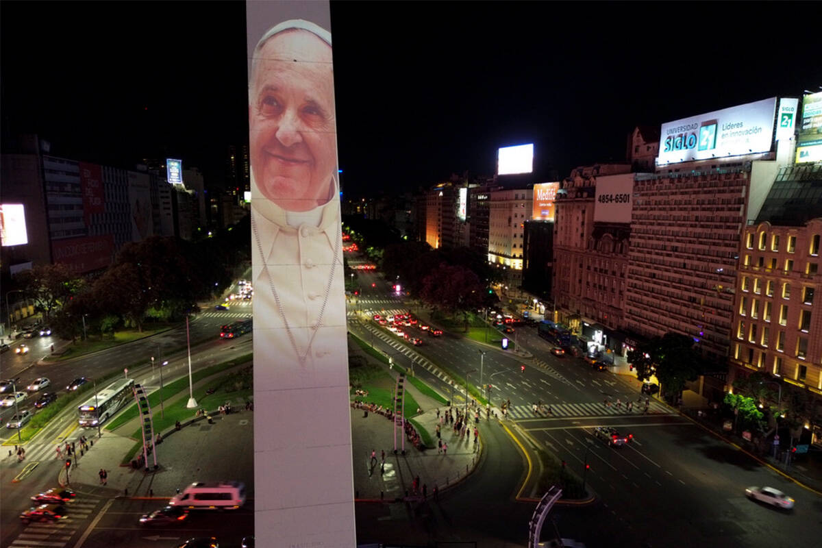 A photo of Pope Francis is projected on the Obelisk in Buenos Aires, Argentina, Saturday, Feb. ...