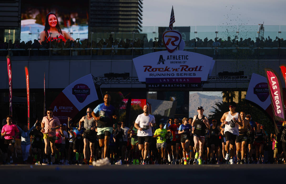 Race participants take off from the start line outside of the New York-New York during the Rock ...