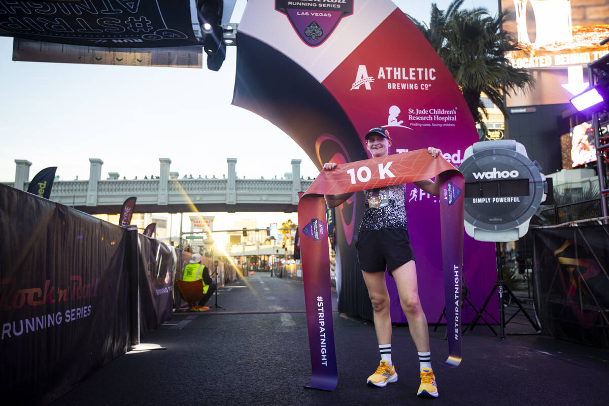 Lindsey Knast poses for a photo after placing first in the woman’s 10k run during the Ro ...