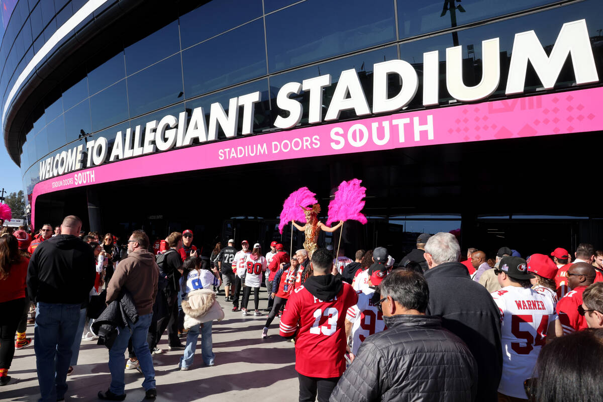 49ers and Chiefs fans arrive at Allegiant Stadium in Las Vegas before their teams complete in t ...