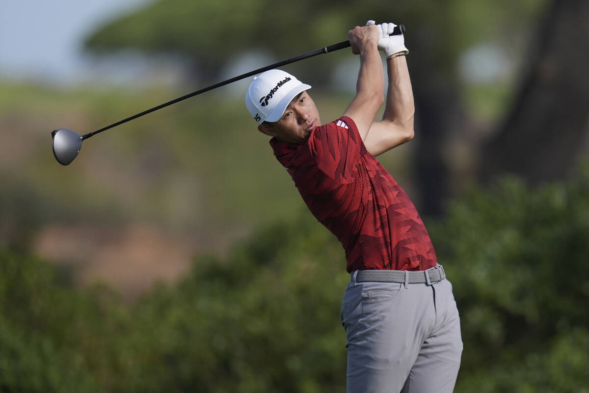 Collin Morikawa hits on the fifth tee of the South Course at Torrey Pines during the third roun ...