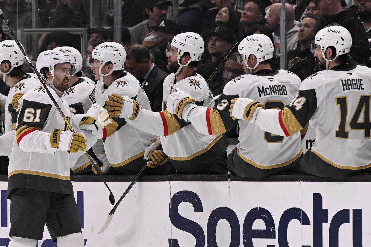 Vegas Golden Knights right wing Mark Stone (61) celebrates with teammates after scoring against ...