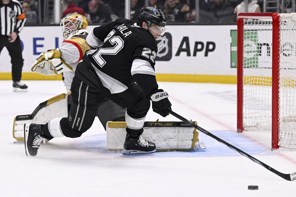 Los Angeles Kings left wing Kevin Fiala (22) misses the deflected puck with Vegas Golden Knight ...