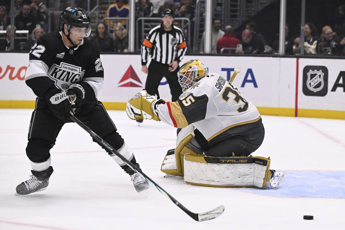Los Angeles Kings left wing Kevin Fiala (22) skates to the puck with Vegas Golden Knights goalt ...