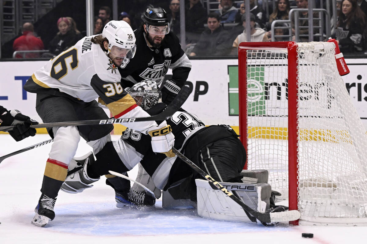 Los Angeles Kings goaltender Darcy Kuemper (35) stops a shot by Vegas Golden Knights center Rap ...