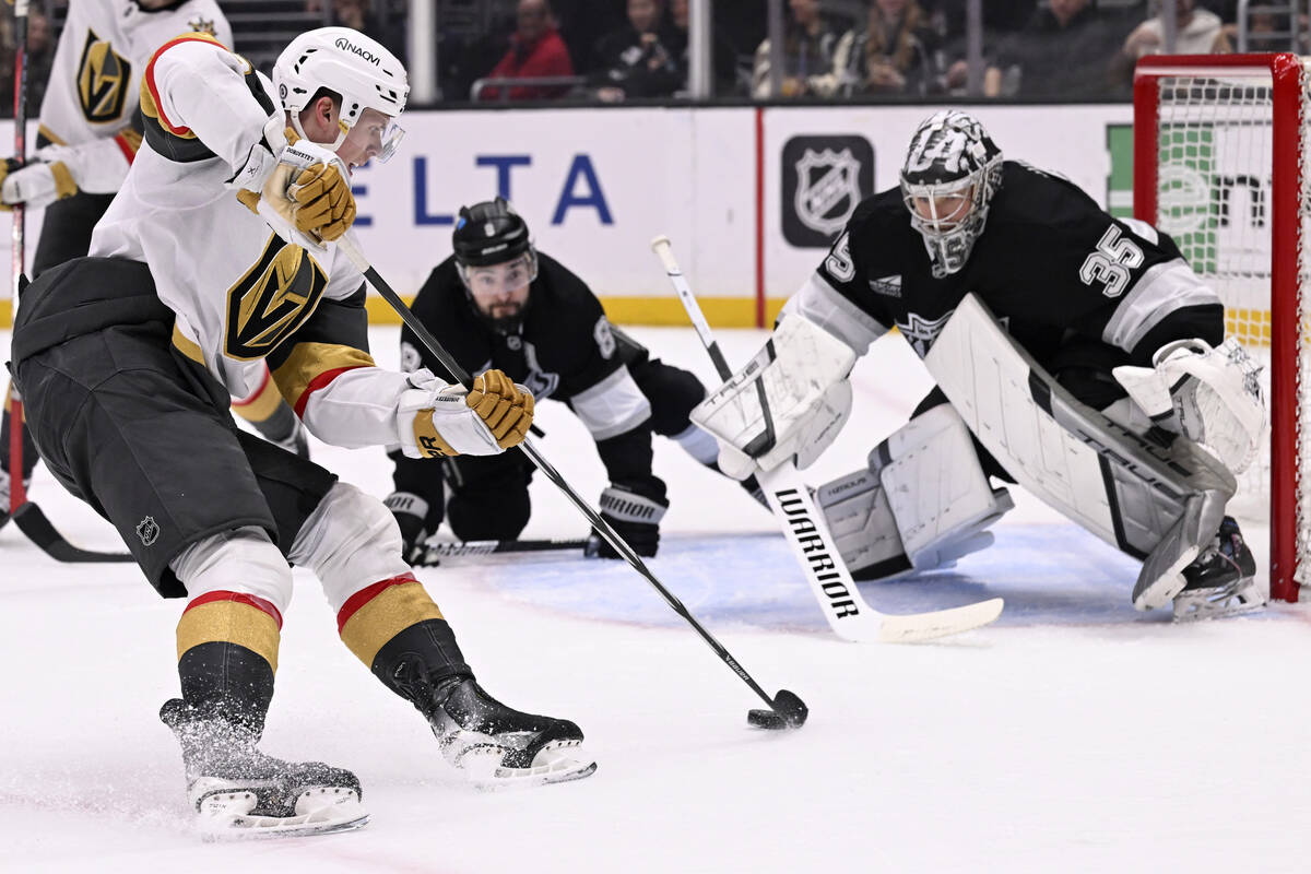 Vegas Golden Knights left wing Pavel Dorofeyev controls the puck with Los Angeles Kings goalten ...