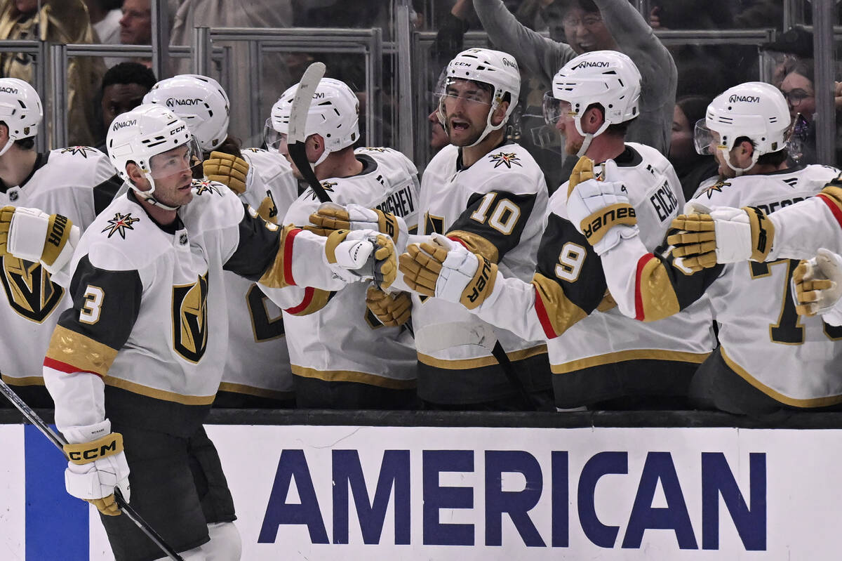 Vegas Golden Knights defenseman Brayden McNabb (3) celebrates with teammates after scoring agai ...