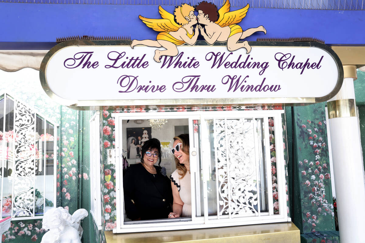 Melody Willis-Williams, president of the Little White Wedding Chapel, right, and officiant Dian ...