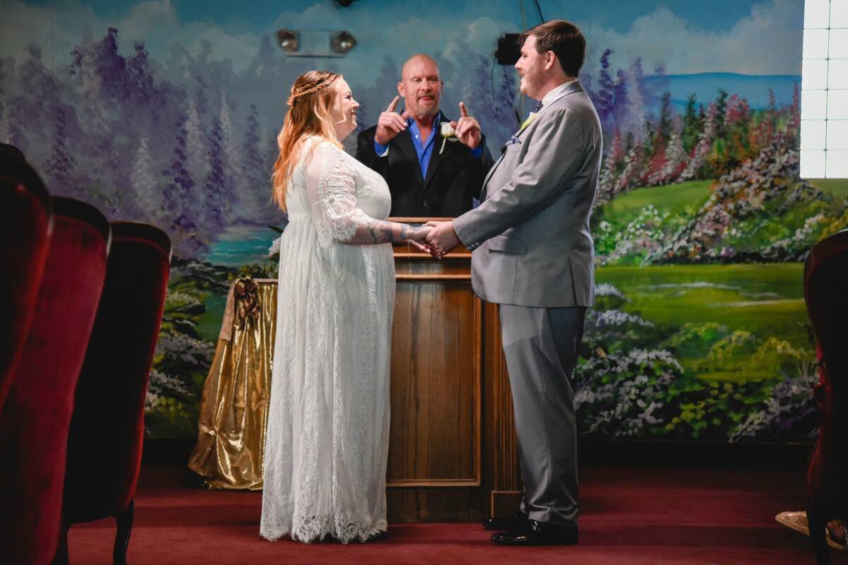 “Stone Cold” Steve Austin officiates a ceremony for two of his fans. (Little White Wedding ...