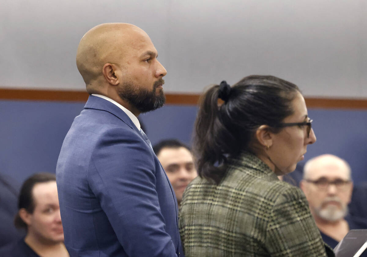 Sgt. Kevin Menon, accused of misconduct and possession of child porn, appears in court with his ...