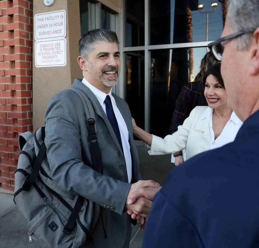 John Anzalone greets supporters before answering questions from the Clark County School Board d ...